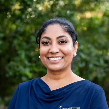 A smiling IntegratePHYSIO clinician